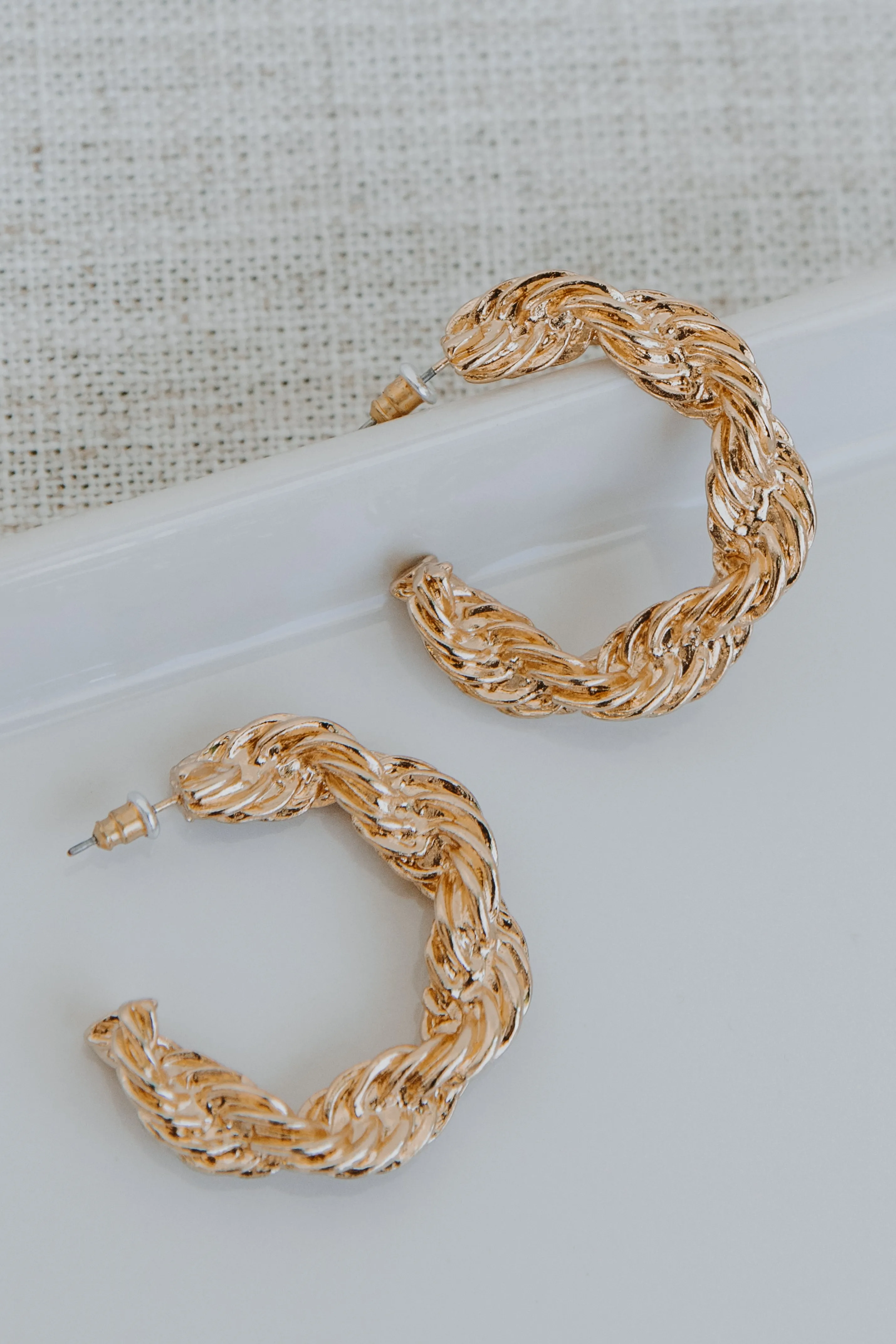 Raven Gold Twisted Hoop Earrings